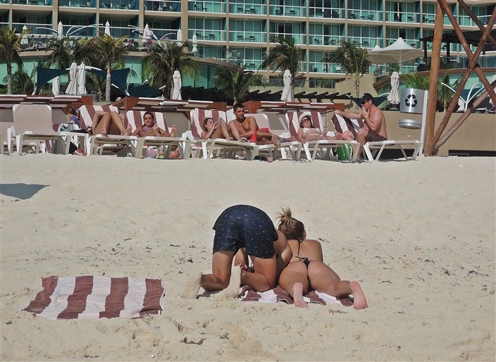 An unusual tanning pose?? Sticking your head in the sand?? Who knows?